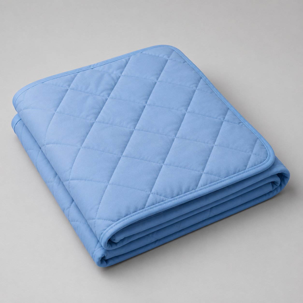 A folded, quilted absorbent underpad